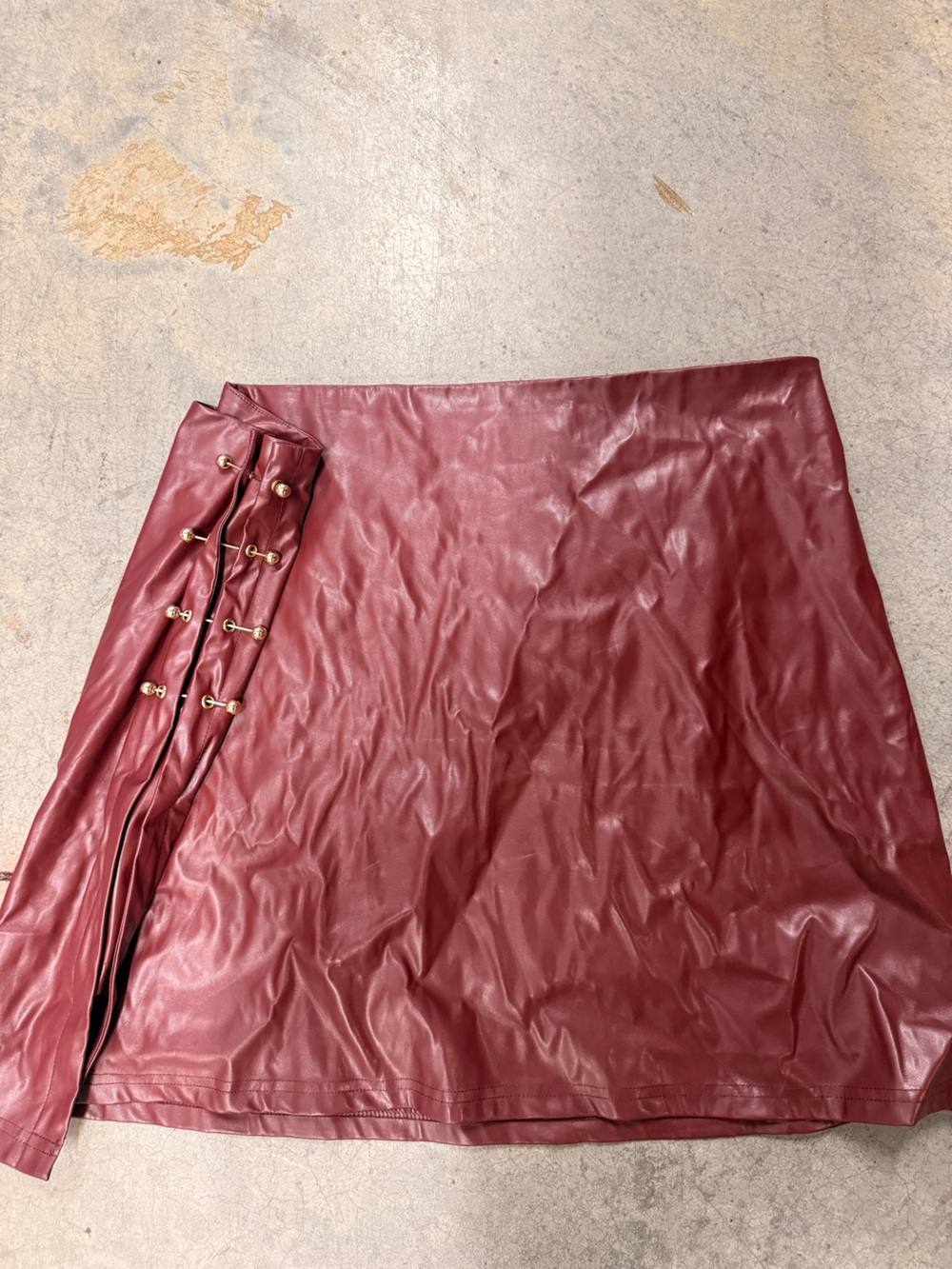 Women’s Faux Leather Burgundy Mini Skirt with Side Hook Detail